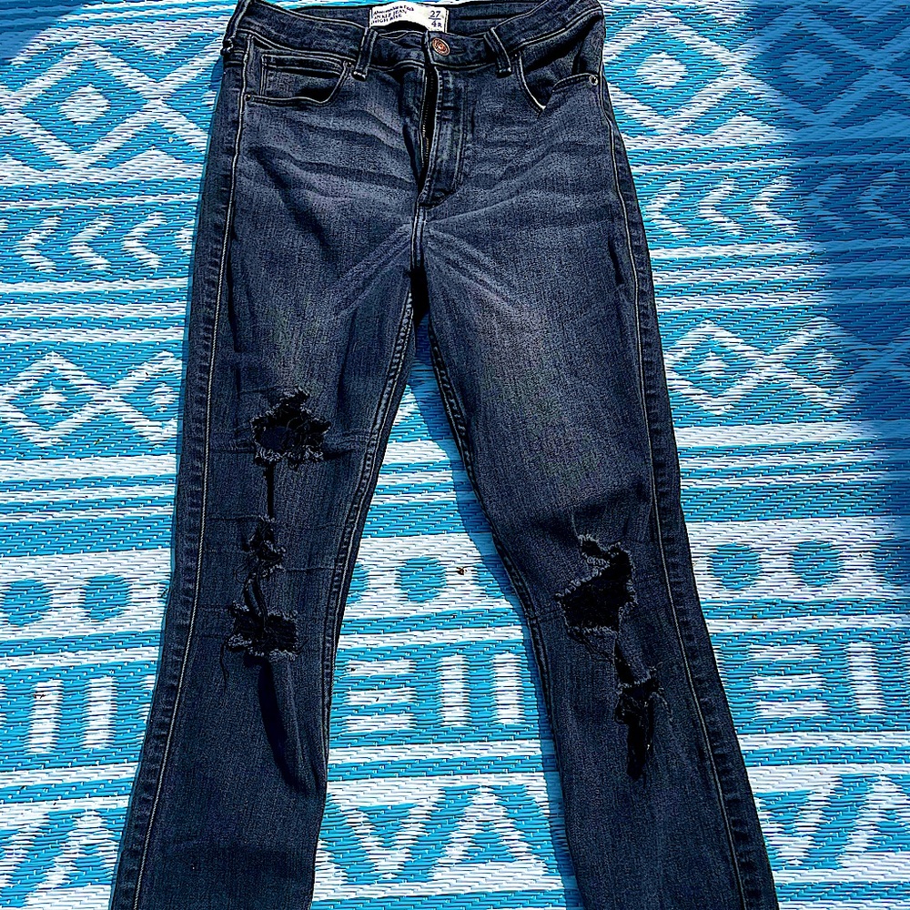 A&F black jeans ripped bottoms and rips in legs